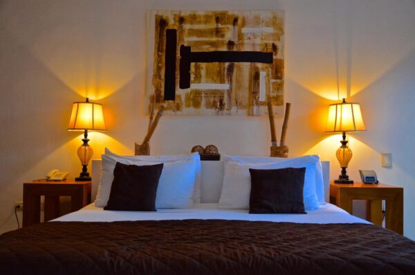 Lit de la chambre de l'hacienda Merida VIP